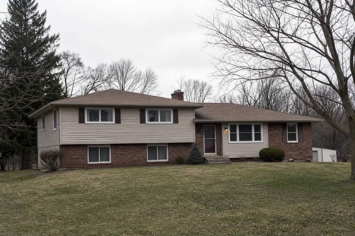 A large 1970s raised ranch on a deep suburban lot — sell my house fast new berlin — Cudahy, WI
